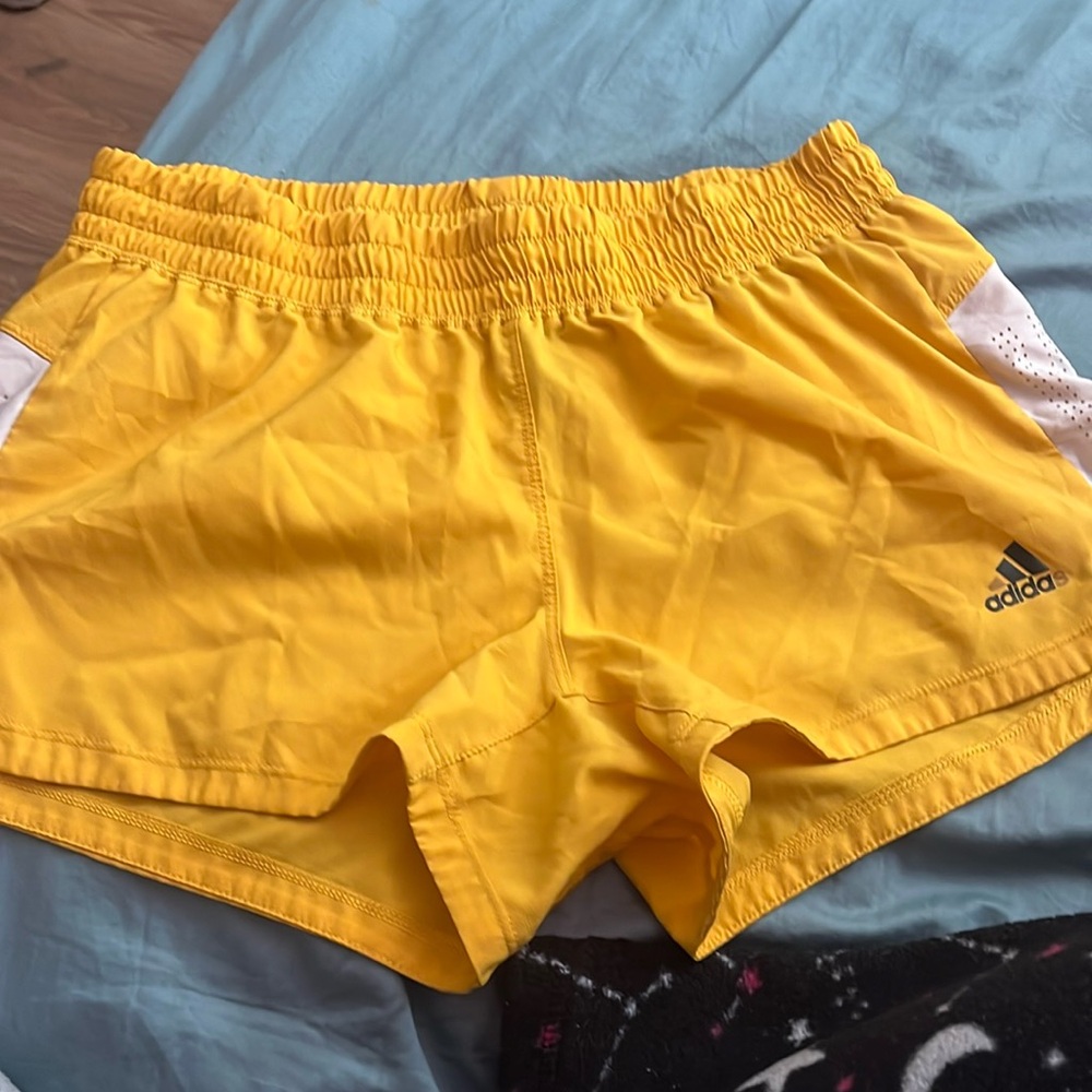 Yellow adidas shorts
